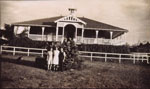 Group of three unidentified people in front of the main building at the Westwood Sanatorium