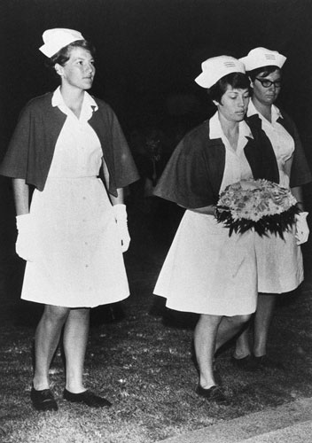 Nurses laying a wreath on Anzac Day 1967