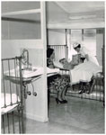 Sister Avis Smith (née Auton) in the Children's Ward of the Rockhampton Hospital in 1964