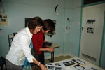 Hazel Voss and Paula Ryan examine material in the ACHHA Collection