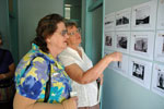 Beverley Pollock and Robyn Carige examine an ACHHA collection display