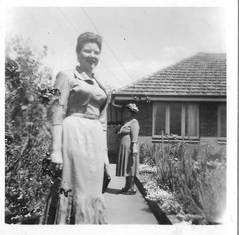 Miss Evelyn Green in the front garden of of Dr Doris Una Skyring‘s home and surgery at 98 Victoria